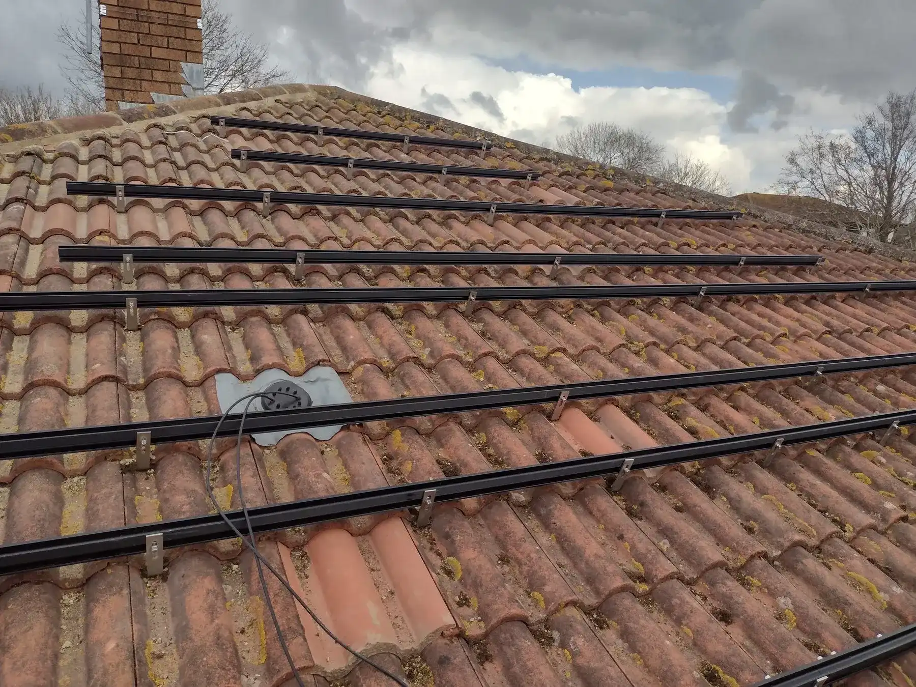 Roof hooks and rails installed ready for solar panels