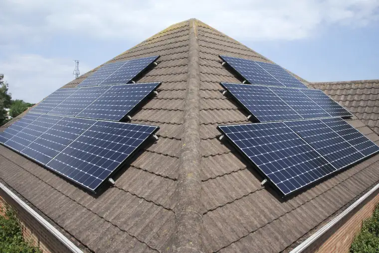 Solar PV panels installed on a pitched roof in Sussex